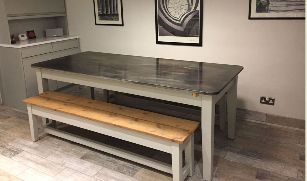 Bespoke solid zinc and wood kitchen or dining table for sale at UKAA with reclaimed pine wooden benches 